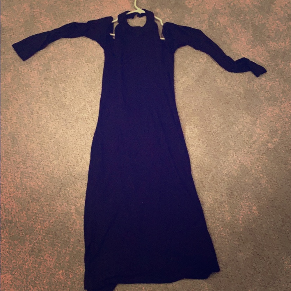 Black dress with low cut back, and high neck
